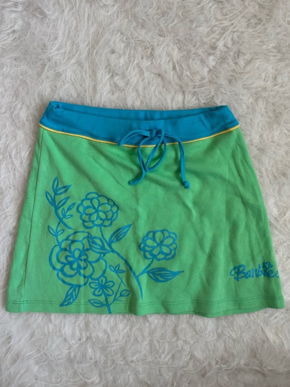Girl’s Vintage 2004 Barbie Green Mini Skirt With Sparkly Blue Florals